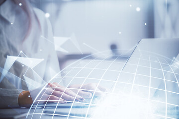 Obraz premium Double exposure of woman hands working on computer and world map hologram drawing. International technology business concept.