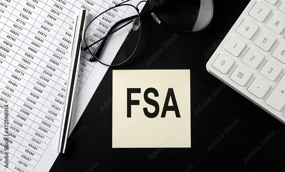 Poster concept fsa message on sticker with glasses,chart and calculator on the black background