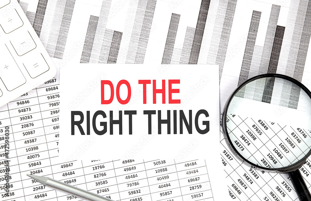 Fototapete do the right thing text on paper with calculator,magnifier ,pen on graph background
