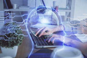Double exposure of woman hands working on computer and brain hologram drawing. Ai concept.