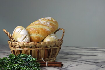 photo of various kind of homemade toast breads menu are on the white marble table during the christmas party