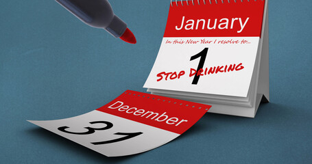 Image of red pen and stop drinking text in red on january 1st of daily calendar