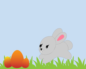 A cute gray rabbit is jumping in the grass in search of Easter eggs.