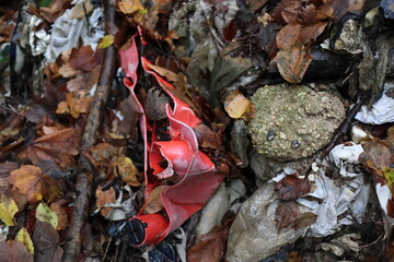 Plastic, metal, and textile pollution in a natural dry creek bed environment - human waste re-emerge after tens of years