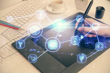 Double exposure of social network sketch hologram and woman holding and using a mobile device.