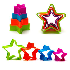 Set of colored shapes in the form of stars for Christmas cookies on a white background. Isolated