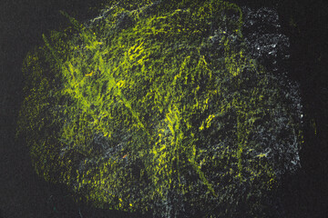 Chaotic strokes of yellow oil crayon