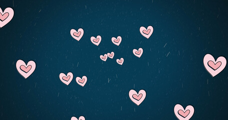 Image of pink hearts moving over snow falling on blue background