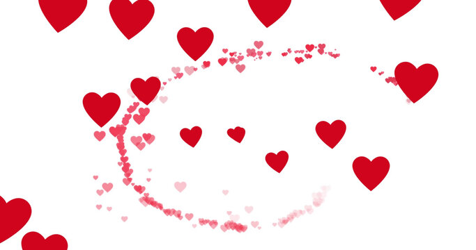 Image of red hearts floating over white background