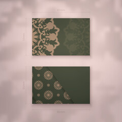 Green color business card with greek brown pattern for your business.