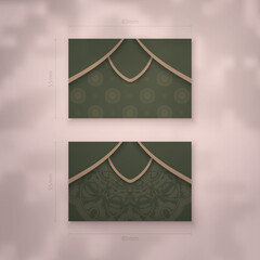 Green color business card with vintage brown pattern for your business.