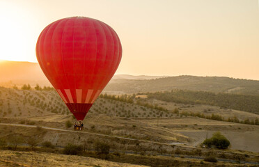Fototapeta na wymiar Beautiful view with the baloon in Pamukkale turkey in the summer