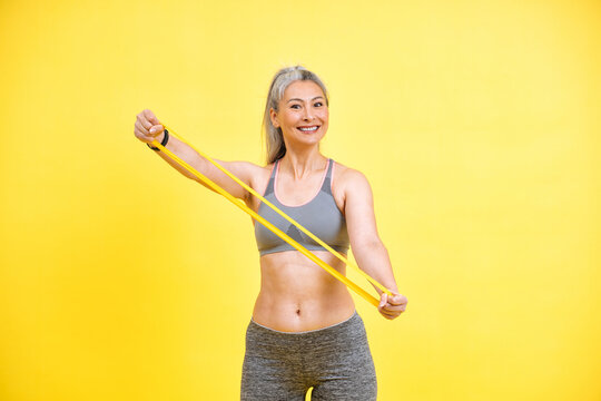 Beautiful Middle Aged Woman Making Sport At The Gym