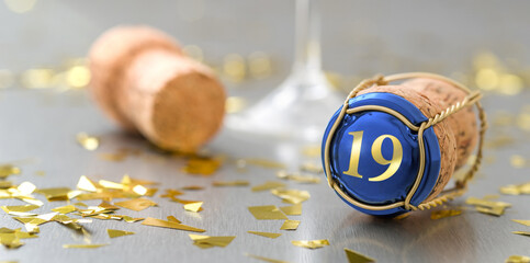 Champagne cap with the Number 19