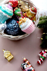 Fototapeta na wymiar Christmas tree toys in a basket on the table