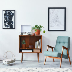 Modern retro composition of living room interior with design wooden cabinet, stylish armchair, mock up poster map, plants, vinyl recorder, books and personal accessories in home decor. Template.