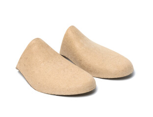 cardboard brown liners on shoes isolated on white background