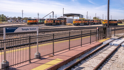 Fototapeta na wymiar Diesel Electric Locomotives in railyard in Temple Texas
