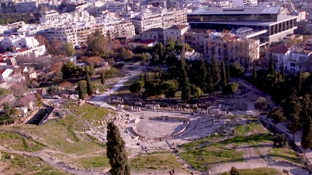 Ruins of an ancient Greek theatre near the Acropolis Museum in Athens, Greece.