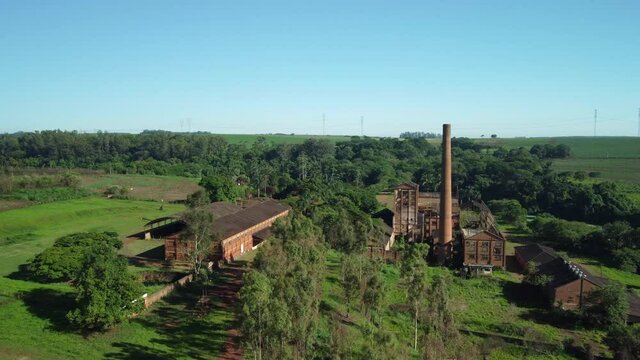 Abandoned sugar mill partially destroyed by weather in Brazil. drone flight, 4k