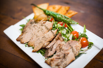 Salad with beef and roasted vegetables