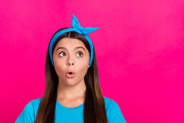 Portrait of attractive amazed brown-haired girl thinking copy space isolated over bright pink magenta color background