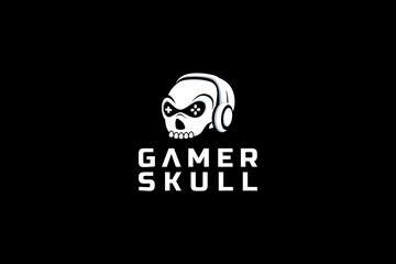 gamer skull logo with skull image wearing headphone as the icon. © cahiwak