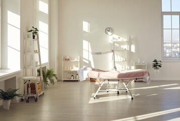 Beautiful interior of new empty massage room, spa center, beauty salon, or dermatological clinic...