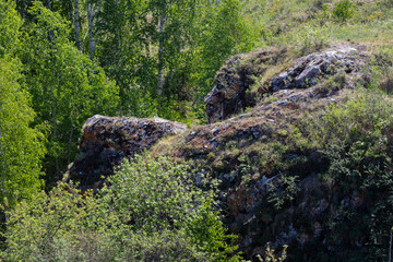 a rocky path leads along the cliff