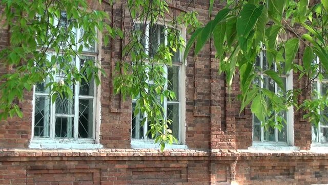 Alapaevsk, Russia - 17 July 2012: Windows of museum of Remembrance of Representatives of Russian Imperial House. Building, which contained relatives of Nicholas II before their execution.