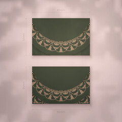 Presentable business card in green with Greek brown ornaments for your brand.