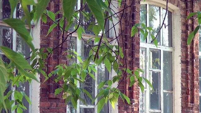 Alapaevsk, Russia - 17 July 2012: Windows of museum of Remembrance of Representatives of Russian Imperial House. Building, which contained relatives of Nicholas II before their execution.