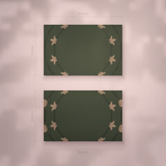 Presentable business card in green with greek brown pattern for your personality.