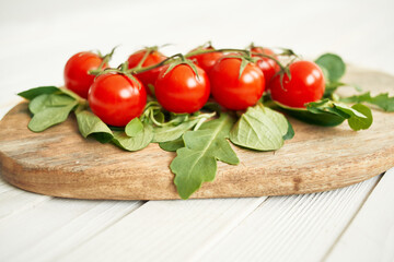 cherry tomatoes lettuce leaves wooden board fresh food