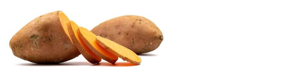 sweet potatoes on a white background. Sliced sweet potato. Empty space for text. Copy space. horizontal view. close up