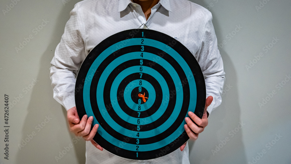 Poster bullseye is a target of business. dart is an opportunity and dartboard is the target and goal. so bo