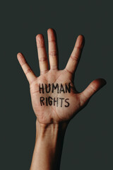 the text human rights in the palm of his hand