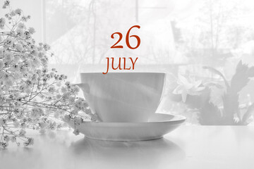 calendar date on light background with porcelain white tea pair and white gypsophila with copy space. July 26 is the twenty-sixth day of the month