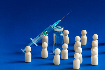 Wooden people in queue to receive a covid vaccine concept. - obrazy, fototapety, plakaty