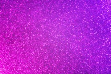 Abstract neon purple and pink gradient glitter background. Great backdrop for any holiday or event. Bokeh light overlay. Color gradient glow.