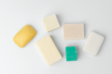 Top view of soap bars flat lay on white background