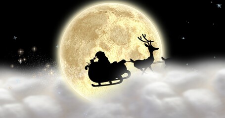 Fototapeta premium Composite image of silhouette santa sleigh against full moon at night with copy space