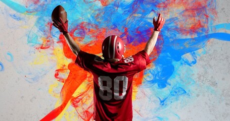 Digital composite image of american footballer celebrating goal over colorful background
