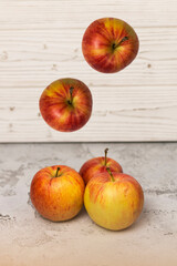 red ripe juicy apples on white