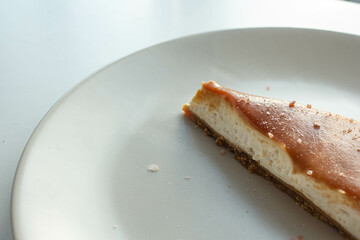 Slice of cheese cake with salted caramel