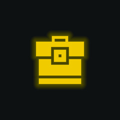 Fototapeta premium Briefcase yellow glowing neon icon
