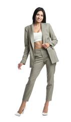 Full length portrait of beautiful woman in formal suit on white background