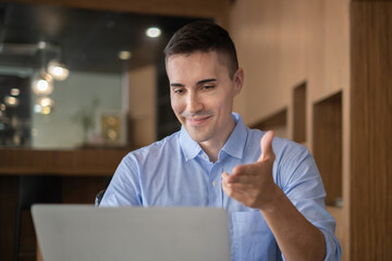 Online video conference and Digital meeting. Businessman discussing business with team by video conference in home office.