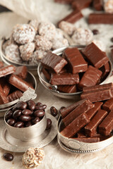 New Year's Eve table full of chocolates for children. Chocolate candy isolated 
