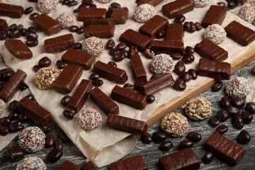 New Year's Eve table full of chocolates for children. Chocolate candy isolated 